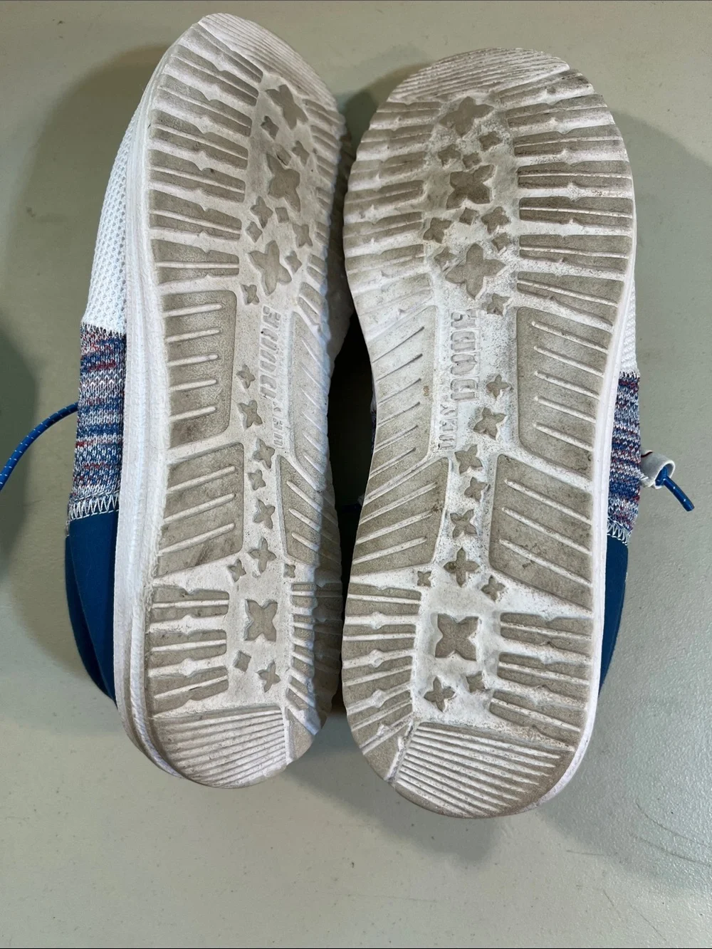 Hey Dude Men’s Slip-On Loafers in White with Blue and Red Accents
